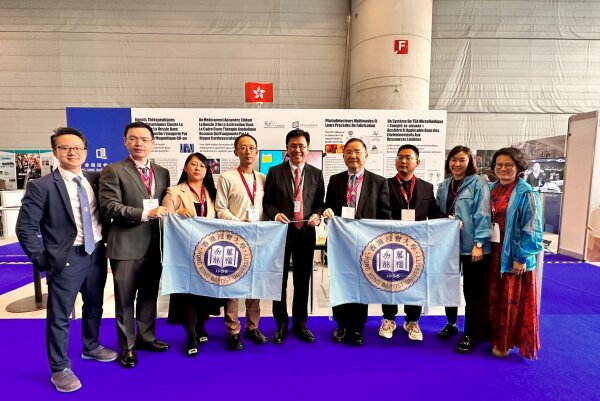Professor Sun Dong, Secretary for Innovation, Technology and Industry of the HKSAR Government (middle) visits HKBU's booth at the 48th International Exhibition of Inventions of Geneva.