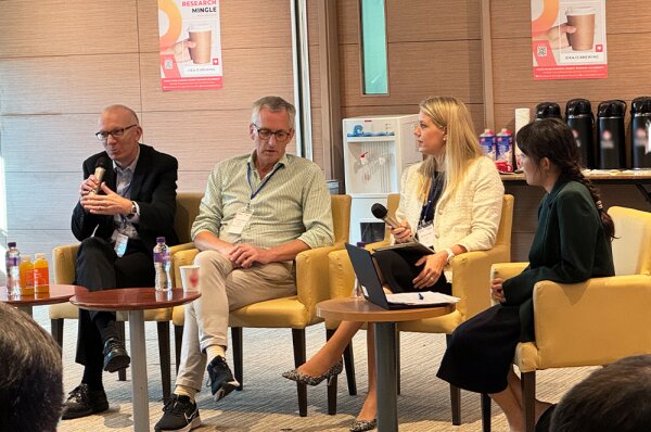 The panel members are (from left to right):) Professor Crispin Coombs, Professor David Parker and Ms Laura Tucker. (right of the photo) Dr Snow Wang from the HKBU Research Office is the moderator of the session.