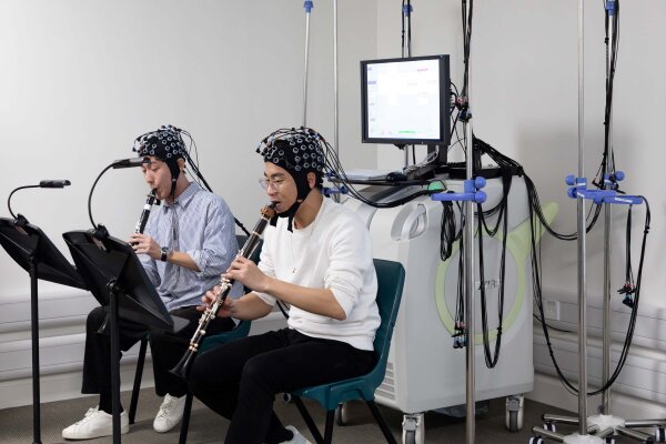 Student musicians participate in the research on the collaborative behaviours in a small music ensemble setting using cutting-edge brain imaging technologies.