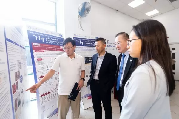 Participants take the opportunity to gain deeper insights into the funded projects and engage with researchers during the poster sessions